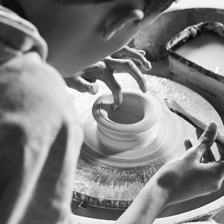 A Person Making Pottery